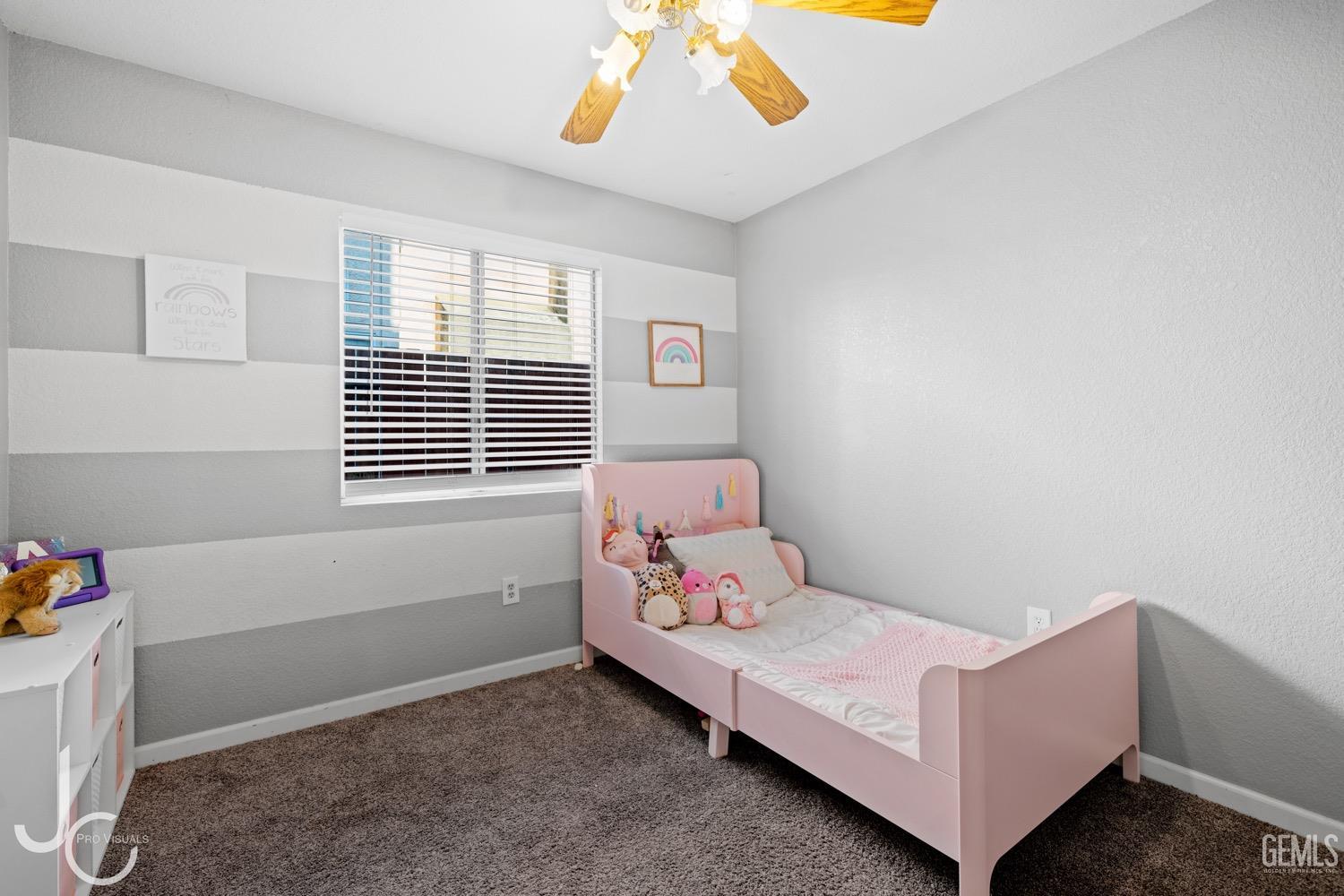 Undisclosed Address Bakersfield, CA 93311 - Photo 10 of 20 a bedroom with furniture and a window