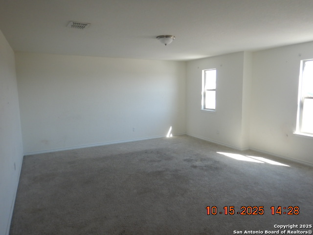 6555 Runaway Row Converse, TX 78109 - Photo 18 of 23 an empty room with windows