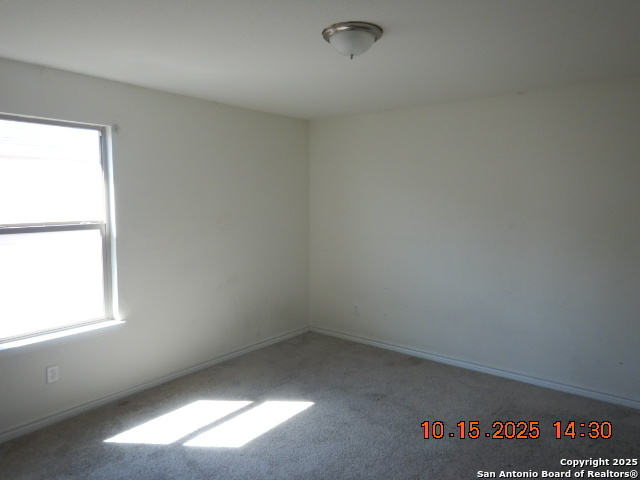 6555 Runaway Row Converse, TX 78109 - Photo 19 of 23 an empty room with a window