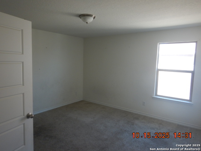 6555 Runaway Row Converse, TX 78109 - Photo 21 of 23 an empty room with a window