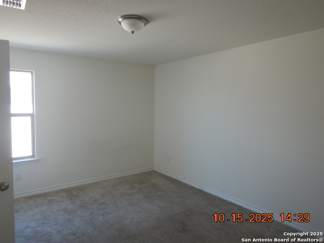 6555 Runaway Row Converse, TX 78109 - Photo 9 of 23 an empty room with a window