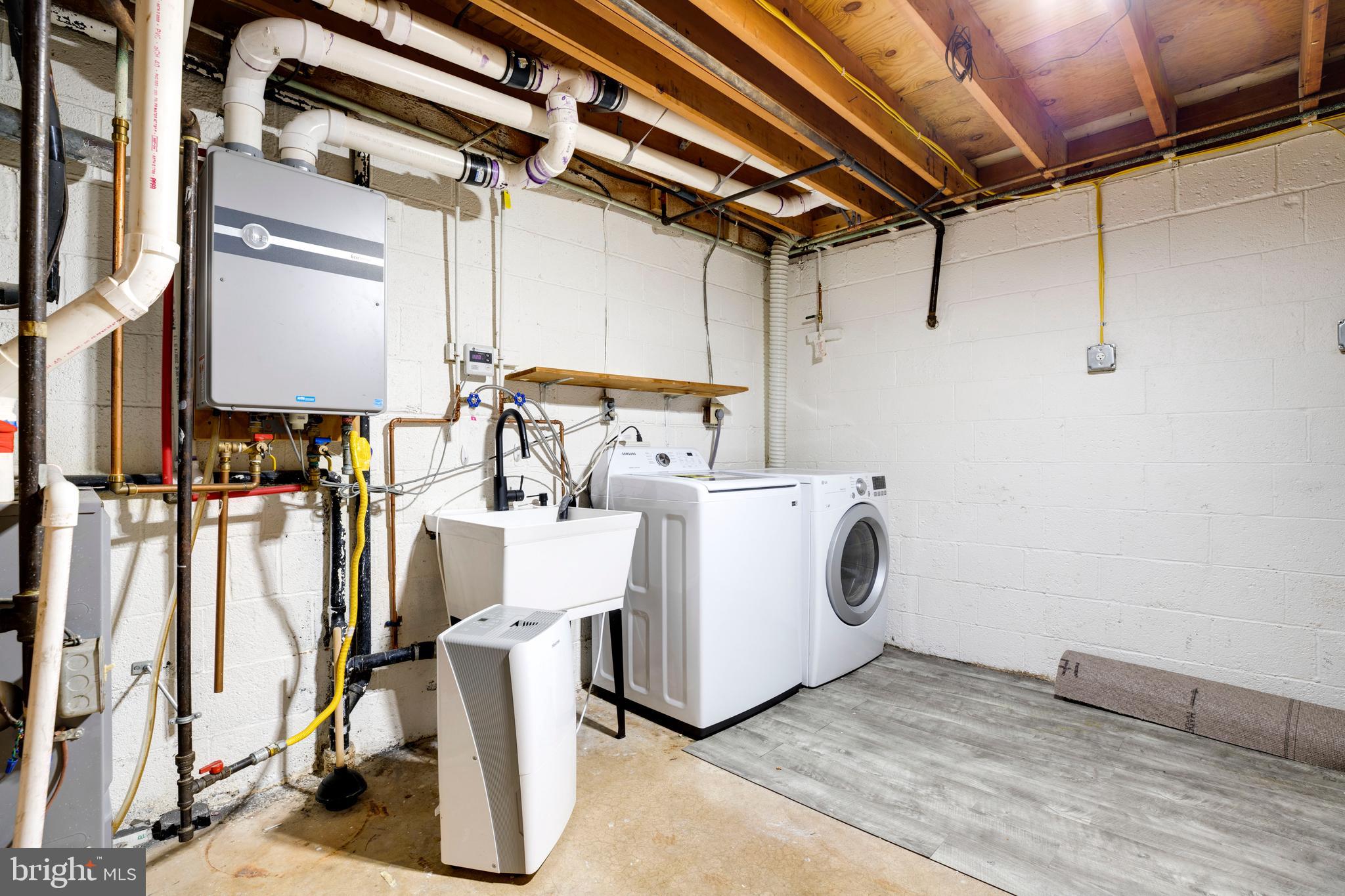 9513 Burdett Road Burke, VA 22015 - Photo 28 of 40 a view of a room with gym equipment