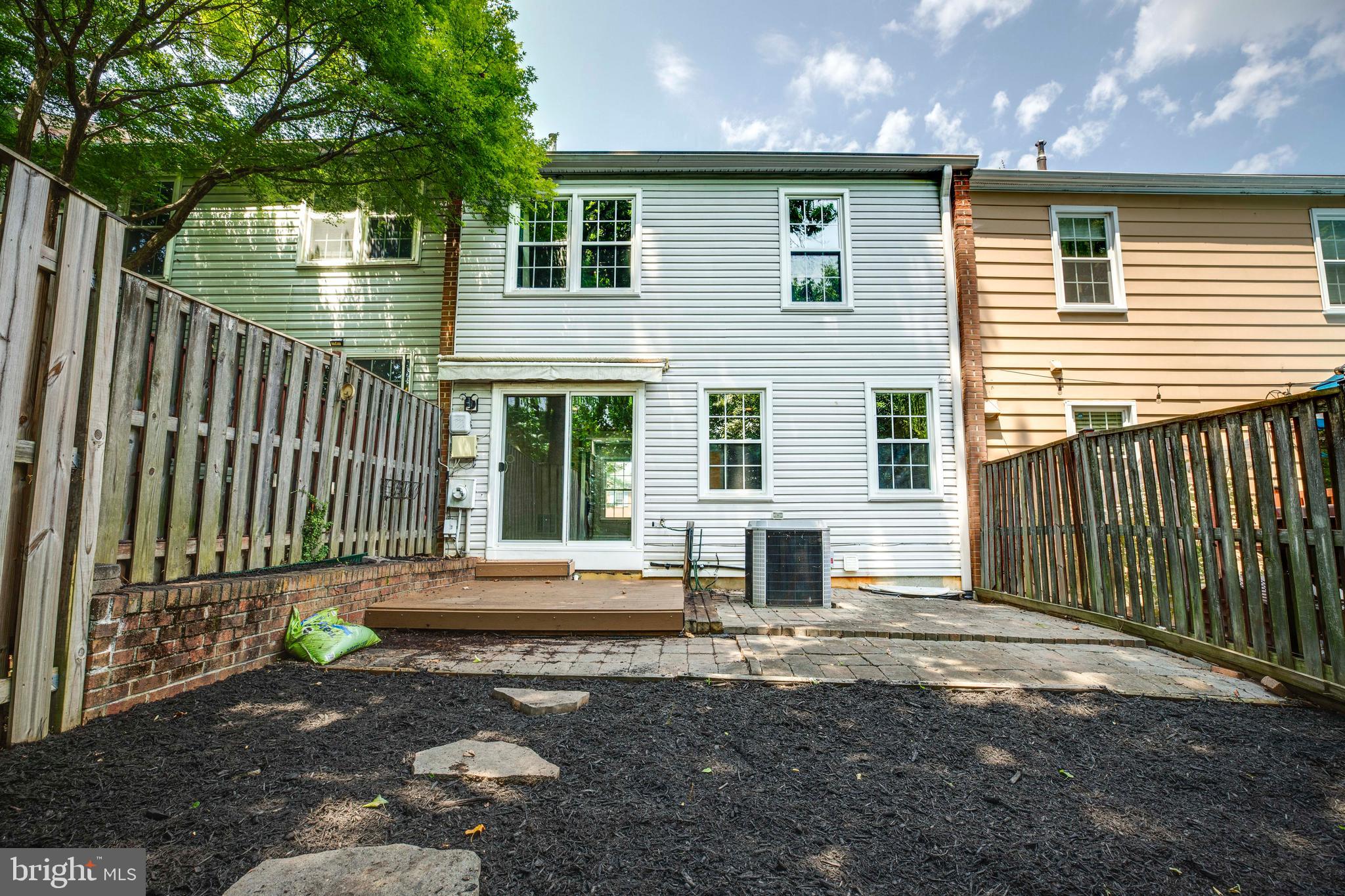 9513 Burdett Road Burke, VA 22015 - Photo 29 of 40 a backyard of a house