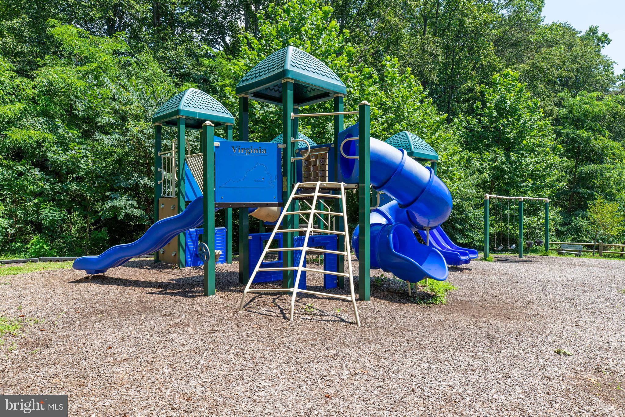 9513 Burdett Road Burke, VA 22015 - Photo 37 of 40 a view of outdoor space with deck and trees