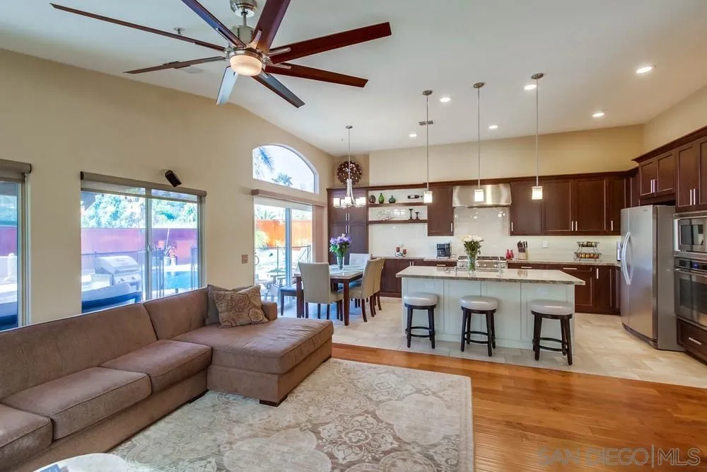 3396 Monique Lane Spring Valley, CA 91977 - Photo 11 of 51 a living room with lots of furniture and kitchen view