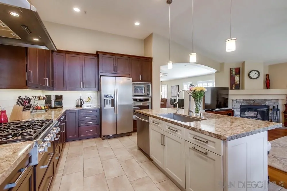 3396 Monique Lane Spring Valley, CA 91977 - Photo 20 of 51 a kitchen with a sink stove and refrigerator