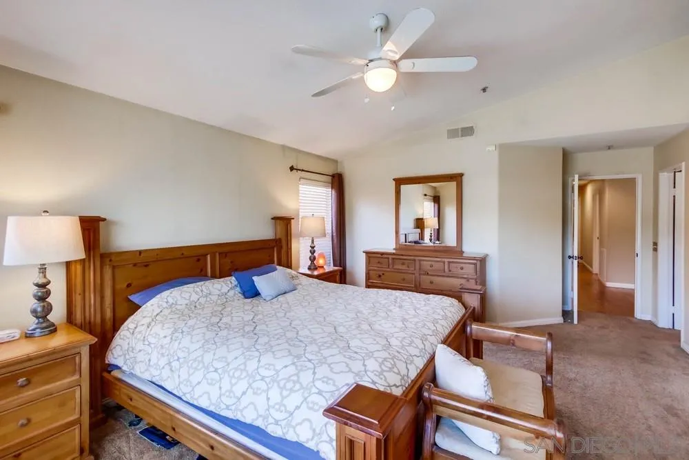 3396 Monique Lane Spring Valley, CA 91977 - Photo 26 of 51 a bedroom with a bed and dresser