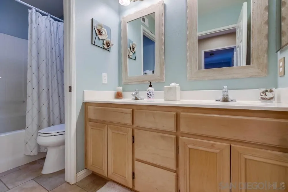 3396 Monique Lane Spring Valley, CA 91977 - Photo 39 of 51 a bathroom with a sink and a toilet