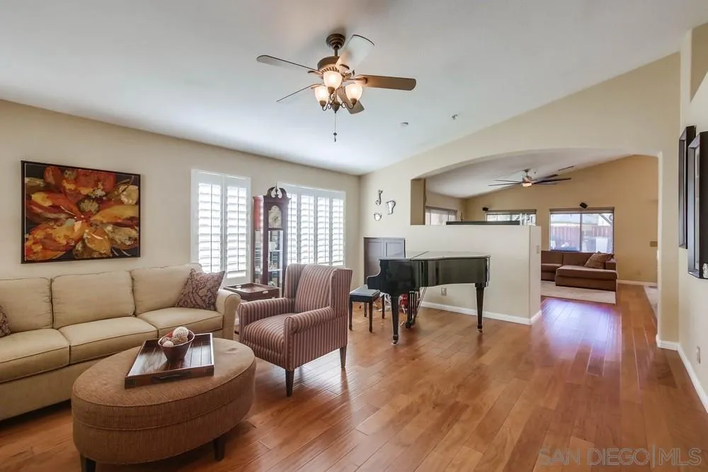 3396 Monique Lane Spring Valley, CA 91977 - Photo 4 of 51 a living room with furniture and a large window