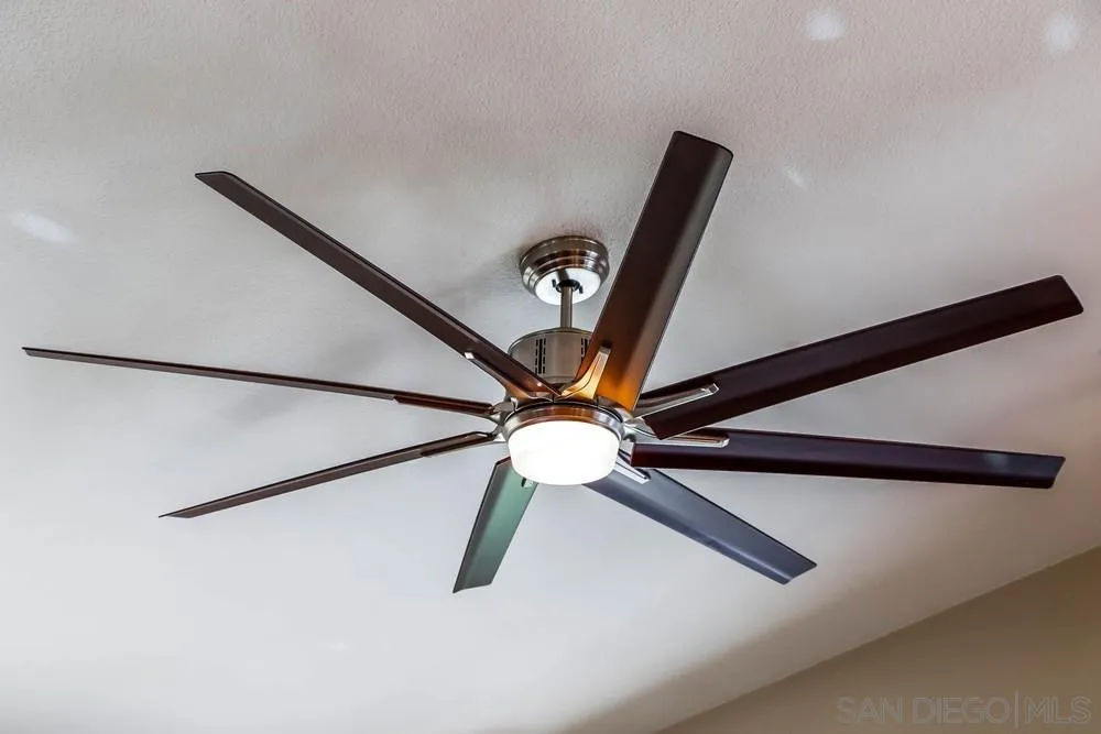 3396 Monique Lane Spring Valley, CA 91977 - Photo 9 of 51 a view of a hallway with a ceiling fan
