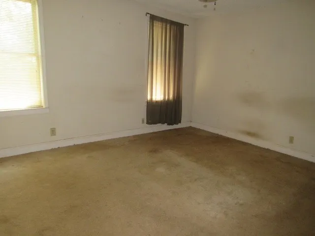 an empty room with a window