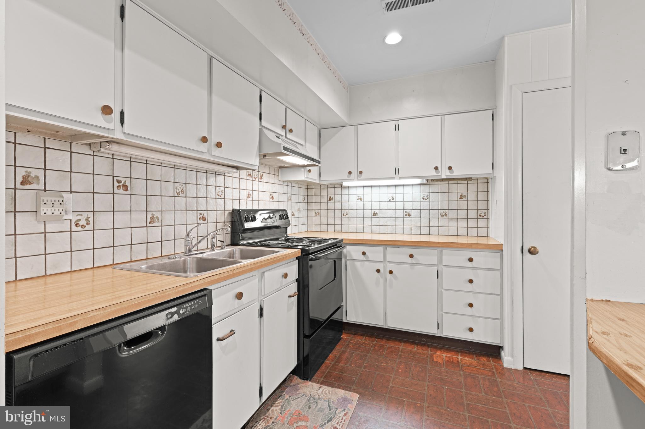 13 Beechtree Lane Mountville, PA 17554 - Photo 12 of 41 a kitchen with a sink dishwasher and white cabinets