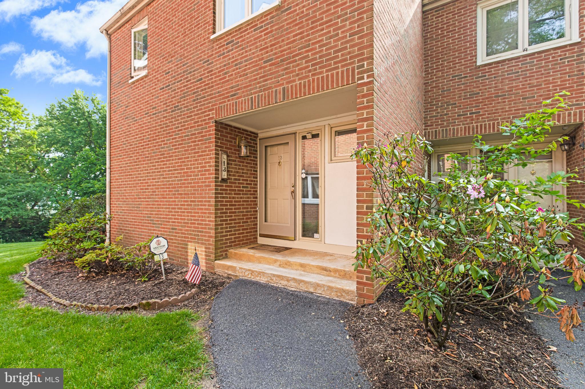 13 Beechtree Lane Mountville, PA 17554 - Photo 2 of 41 a front view of a house with garden