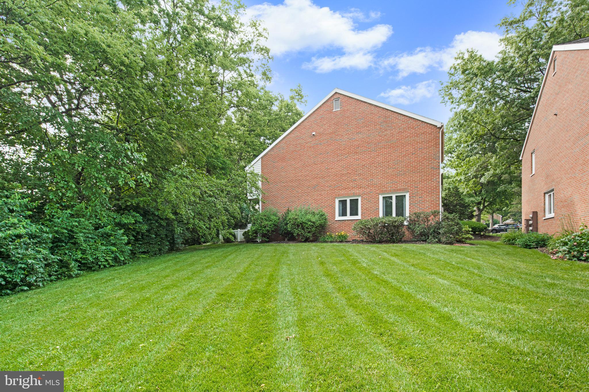 13 Beechtree Lane Mountville, PA 17554 - Photo 34 of 41 a view of a house next to a big yard and large trees