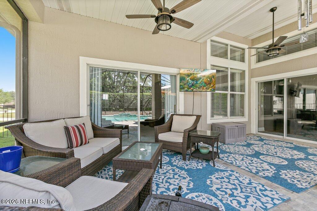 841 Ifield Road St. Augustine, FL 32095 - Photo 40 of 69 a living room with furniture and a large window