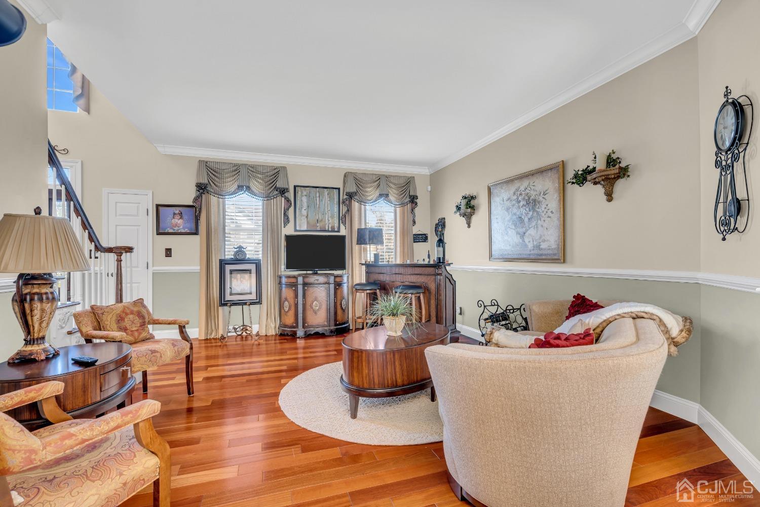 58 Stratton Road Old Bridge, NJ 07747 - Photo 22 of 44 a living room with furniture and a flat screen tv