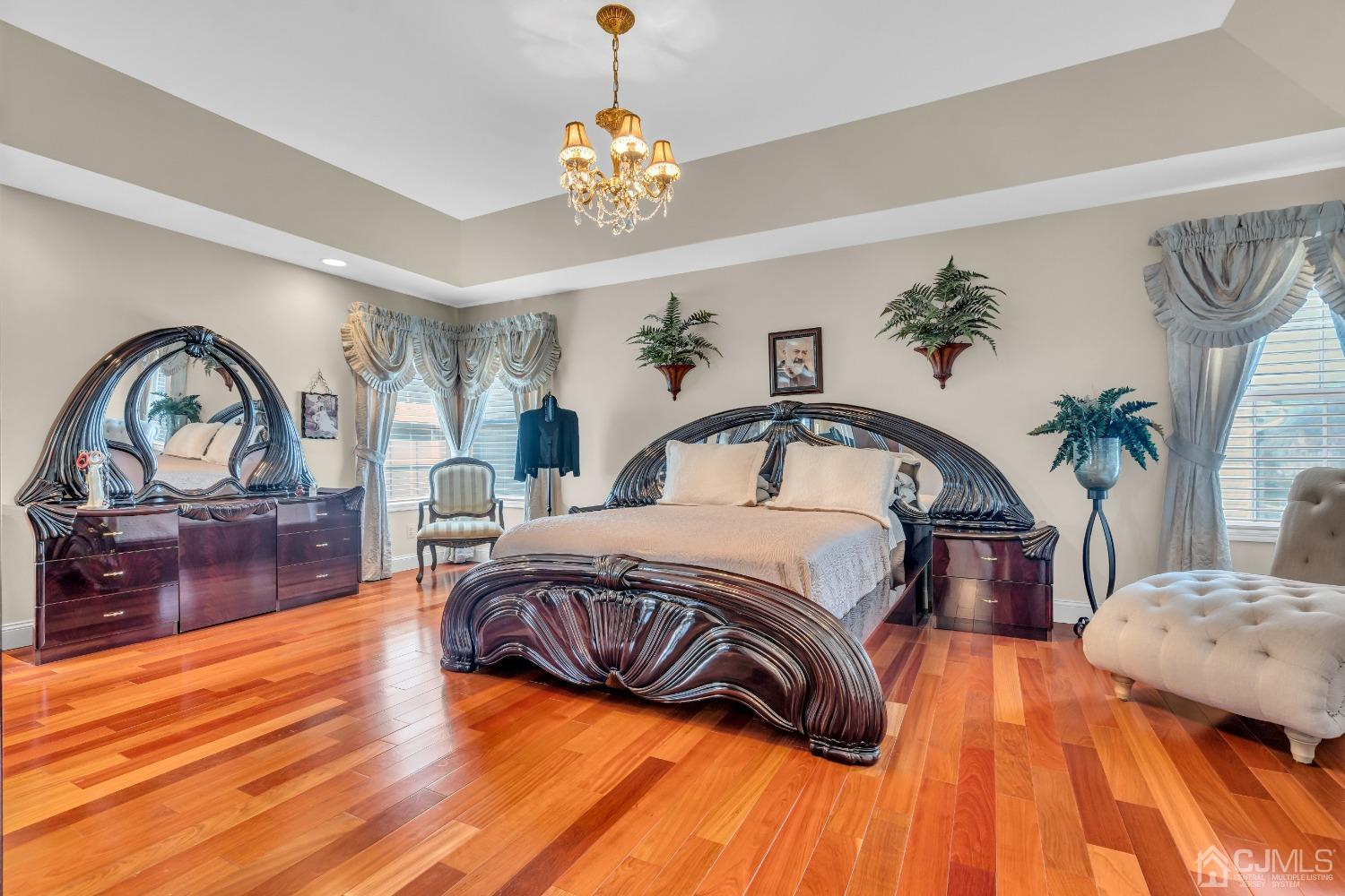 58 Stratton Road Old Bridge, NJ 07747 - Photo 25 of 44 a spacious bedroom with a bed and a dresser