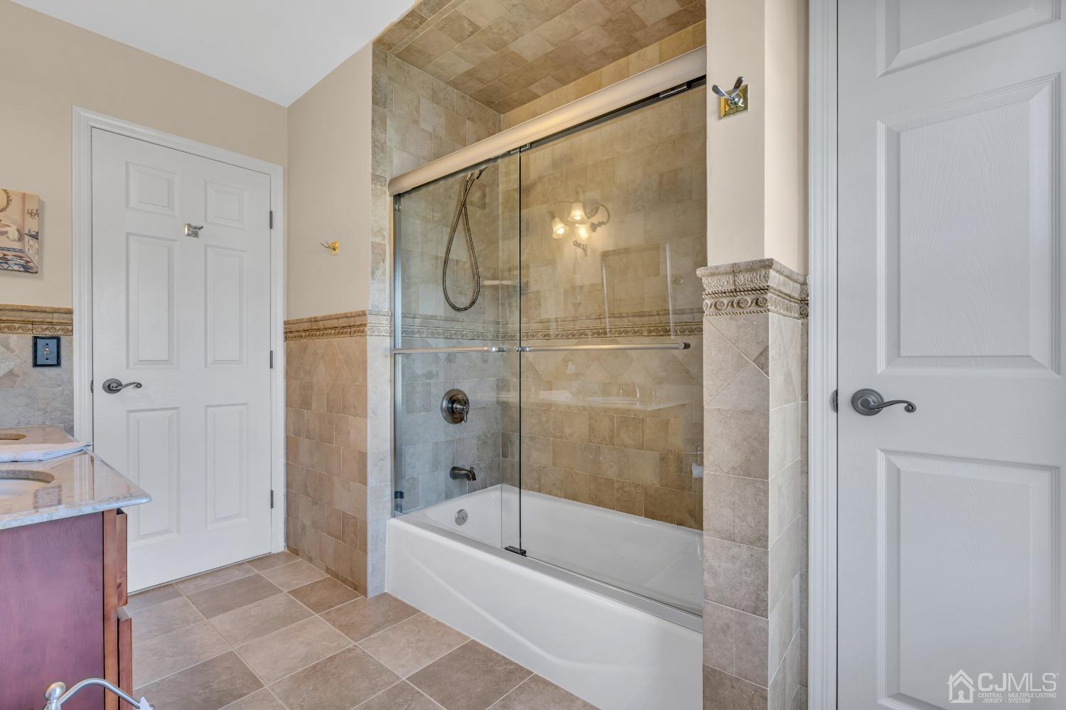 58 Stratton Road Old Bridge, NJ 07747 - Photo 33 of 44 a bathroom with a bathtub and a shower