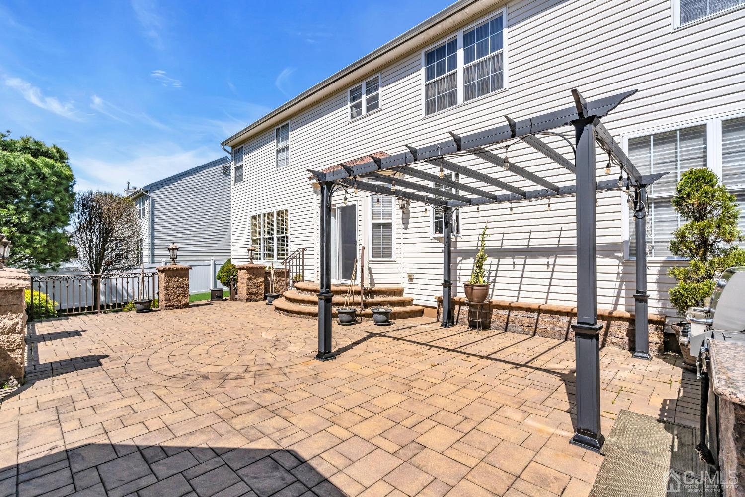 58 Stratton Road Old Bridge, NJ 07747 - Photo 39 of 44 a building outdoor space with patio furniture and potted plants