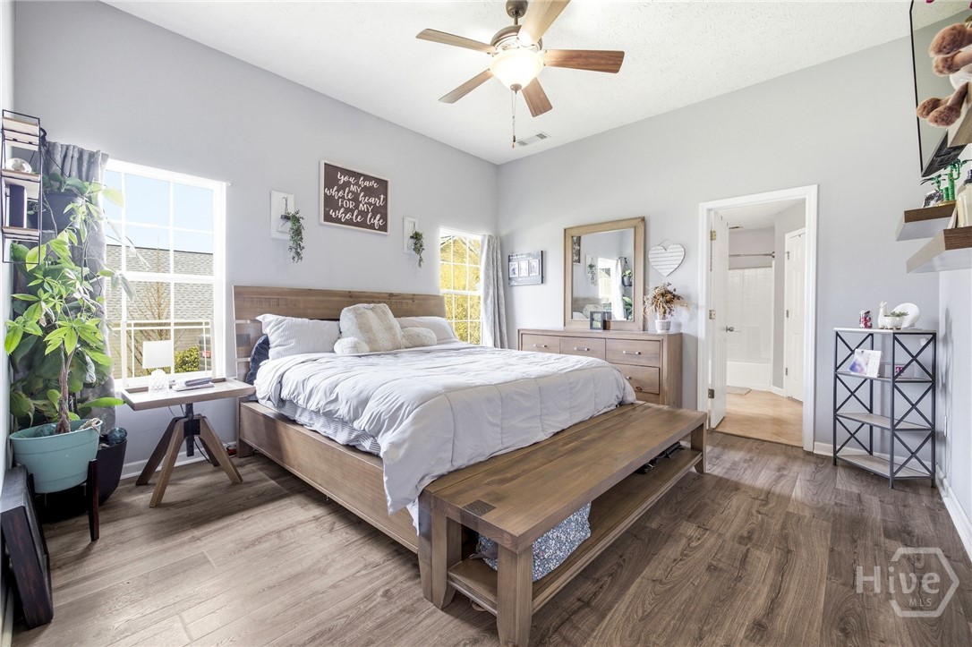121 Crestview Drive Carnesville, GA 30521 - Photo 13 of 28 Spacious room featuring wood-finish flooring, light grey walls, and a ceiling fan with integrated lighting