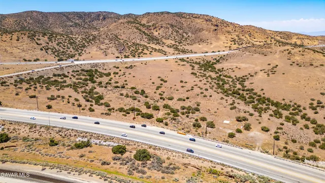 a view of a mountain with a mountain