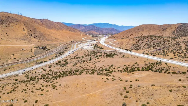 a view of a mountain with a mountain