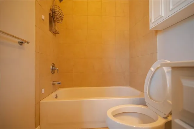 a bathroom with a bath tub
