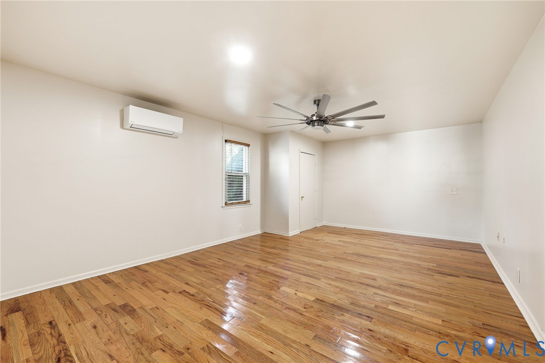 2521 Fort Lee Road Petersburg, VA 23805 - Photo 20 of 27 a view of a livingroom with a ceiling fan and window