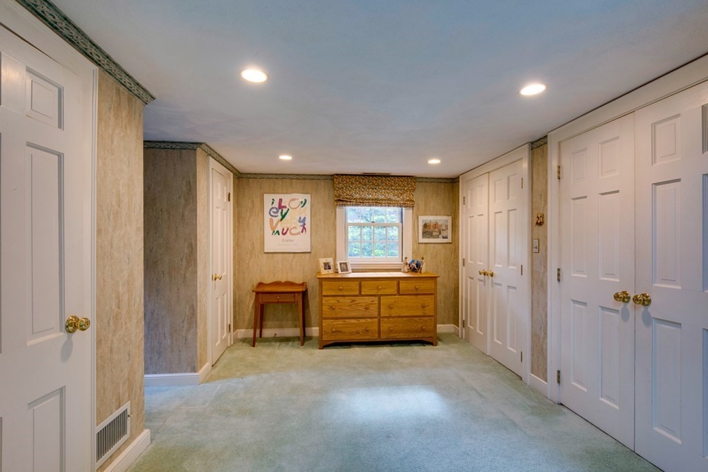 29 Sheridan Road Wellesley, MA 02481 - Photo 24 of 32 a view of a big room with windows and cabinet