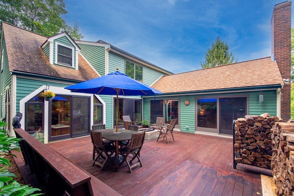 29 Sheridan Road Wellesley, MA 02481 - Photo 28 of 32 a patio with a table and chairs