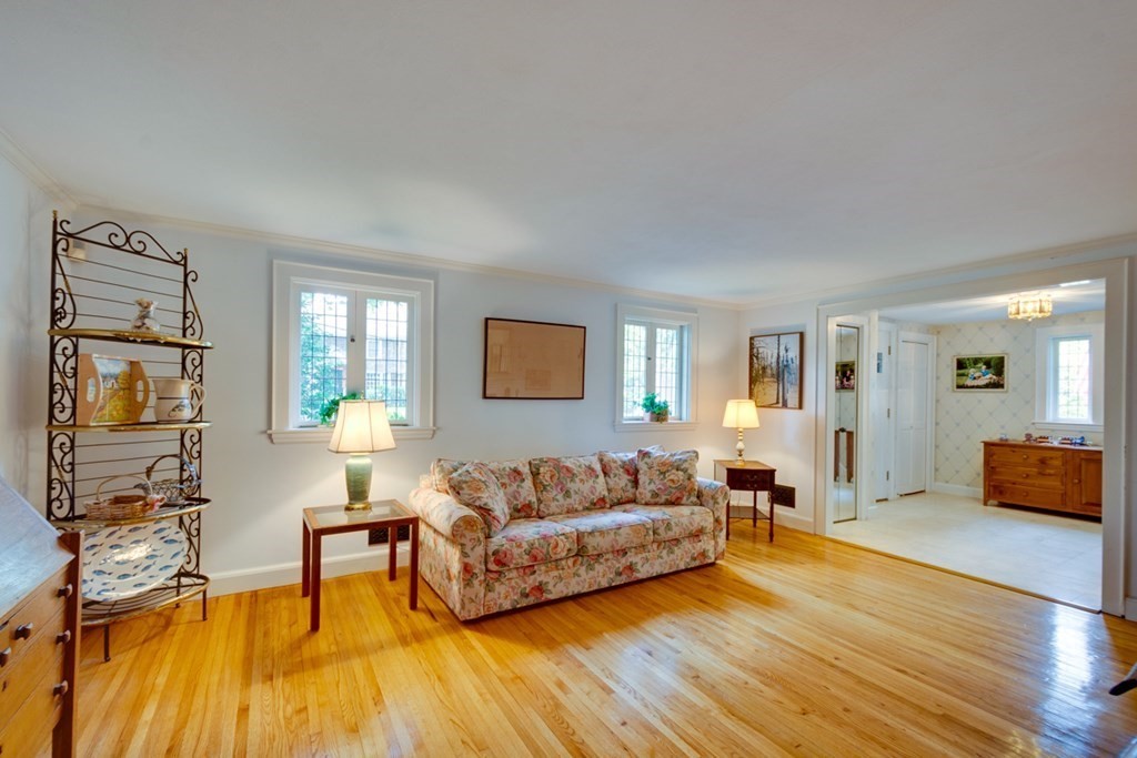 29 Sheridan Road Wellesley, MA 02481 - Photo 5 of 32 a living room with furniture and a wooden floor