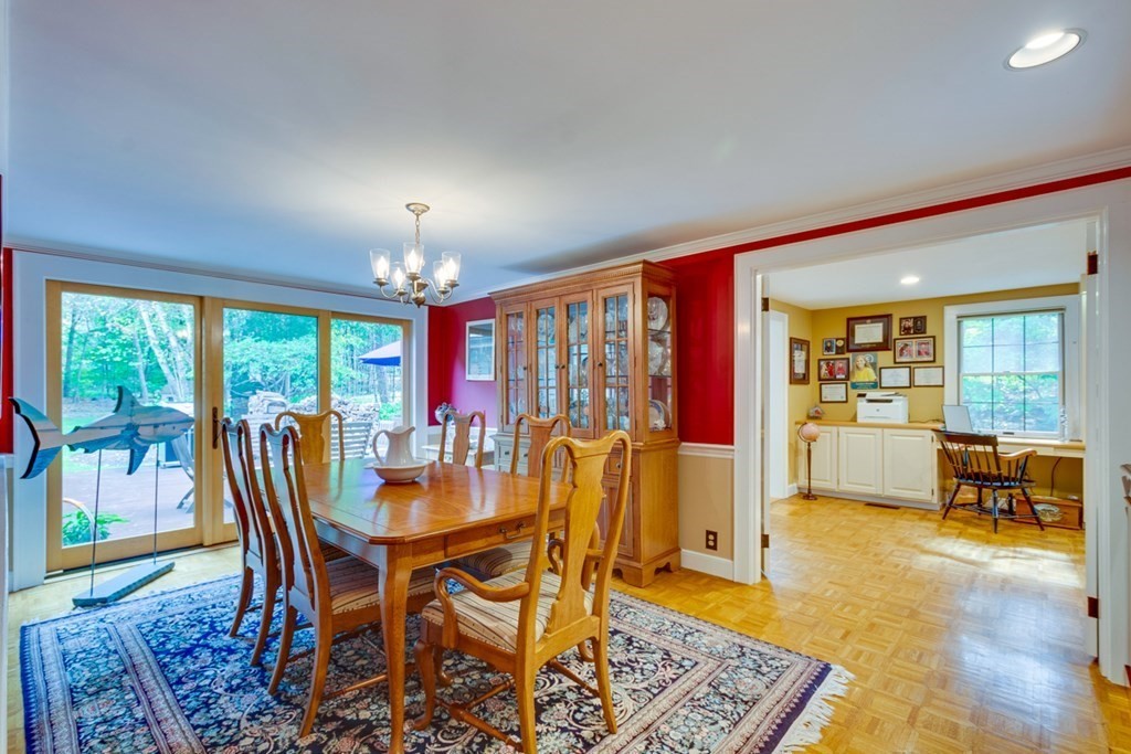29 Sheridan Road Wellesley, MA 02481 - Photo 6 of 32 a dining room with furniture a chandelier and wooden floor
