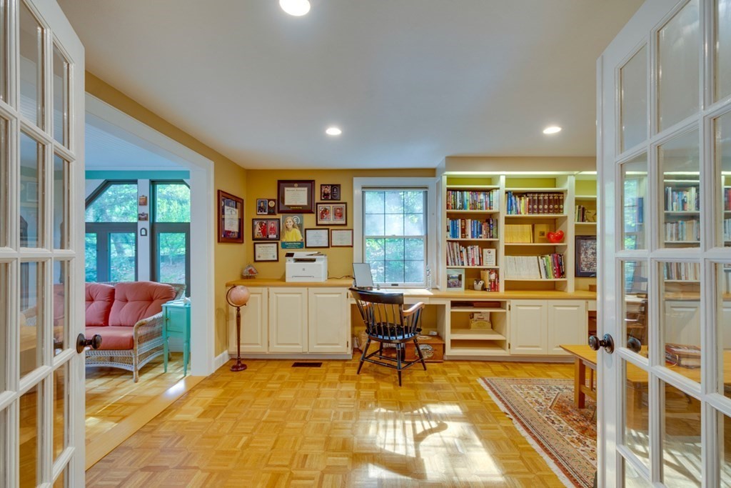 29 Sheridan Road Wellesley, MA 02481 - Photo 7 of 32 a room with furniture and a book shelf
