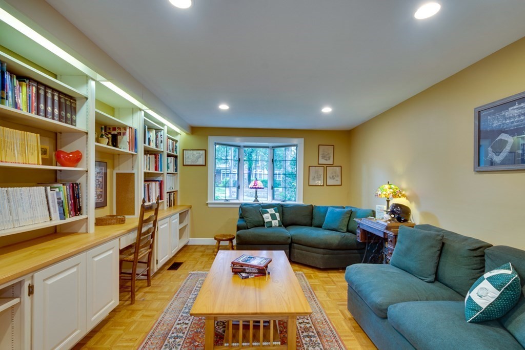 29 Sheridan Road Wellesley, MA 02481 - Photo 8 of 32 a living room with furniture and a book shelf