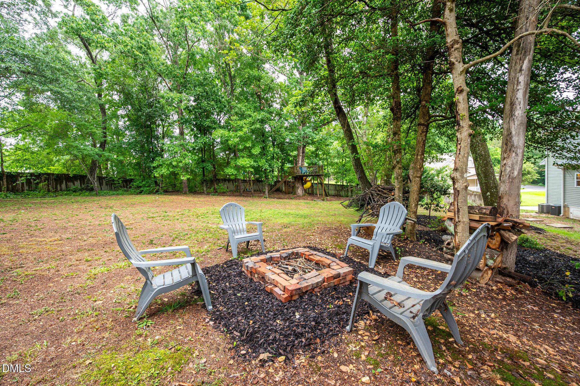 726 Ruth Circle Fuquay-Varina, NC 27526 - Photo 44 of 61 a view of a chairs and table in the patio