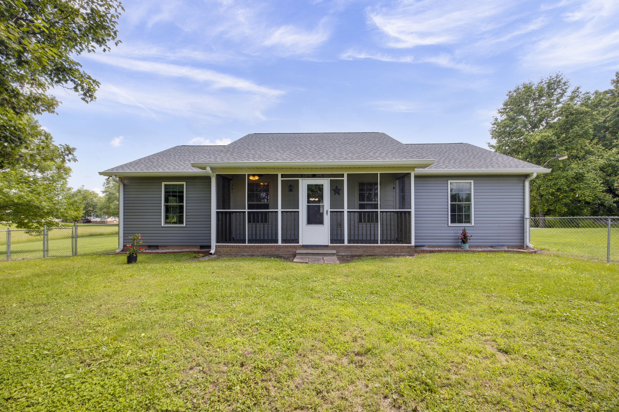 880 Denning Ford Road Portland, TN 37148 - Photo 1 of 54 a view of a house with a backyard