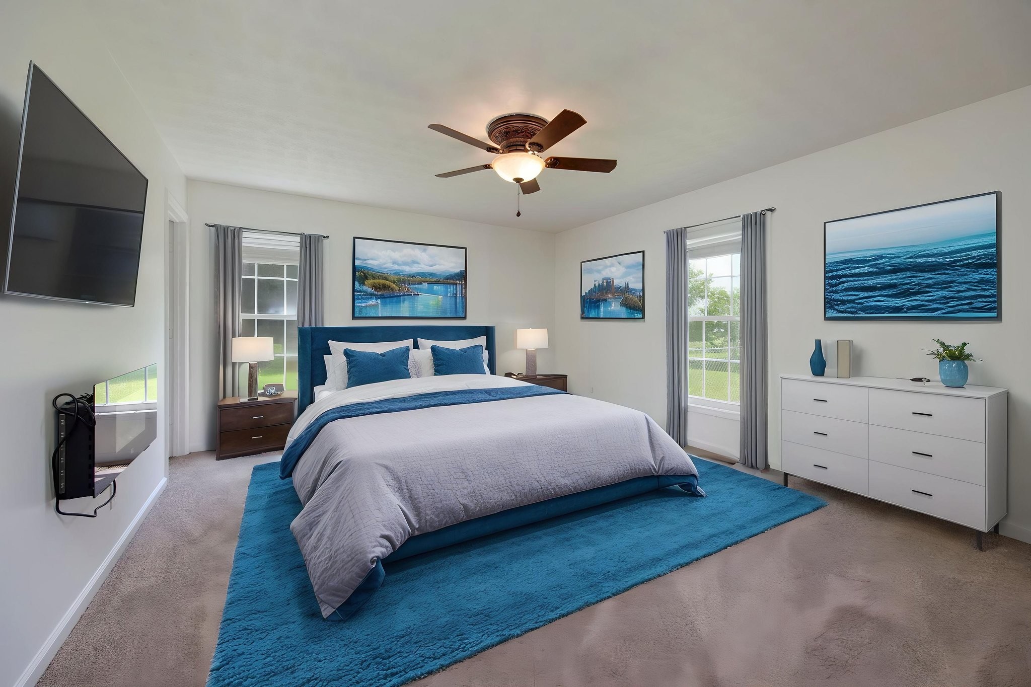 880 Denning Ford Road Portland, TN 37148 - Photo 17 of 54 a bedroom with a large bed and a tv