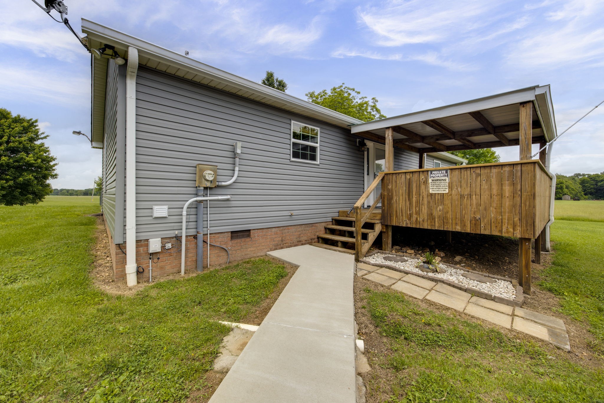 880 Denning Ford Road Portland, TN 37148 - Photo 31 of 54 a view of a back yard of the house