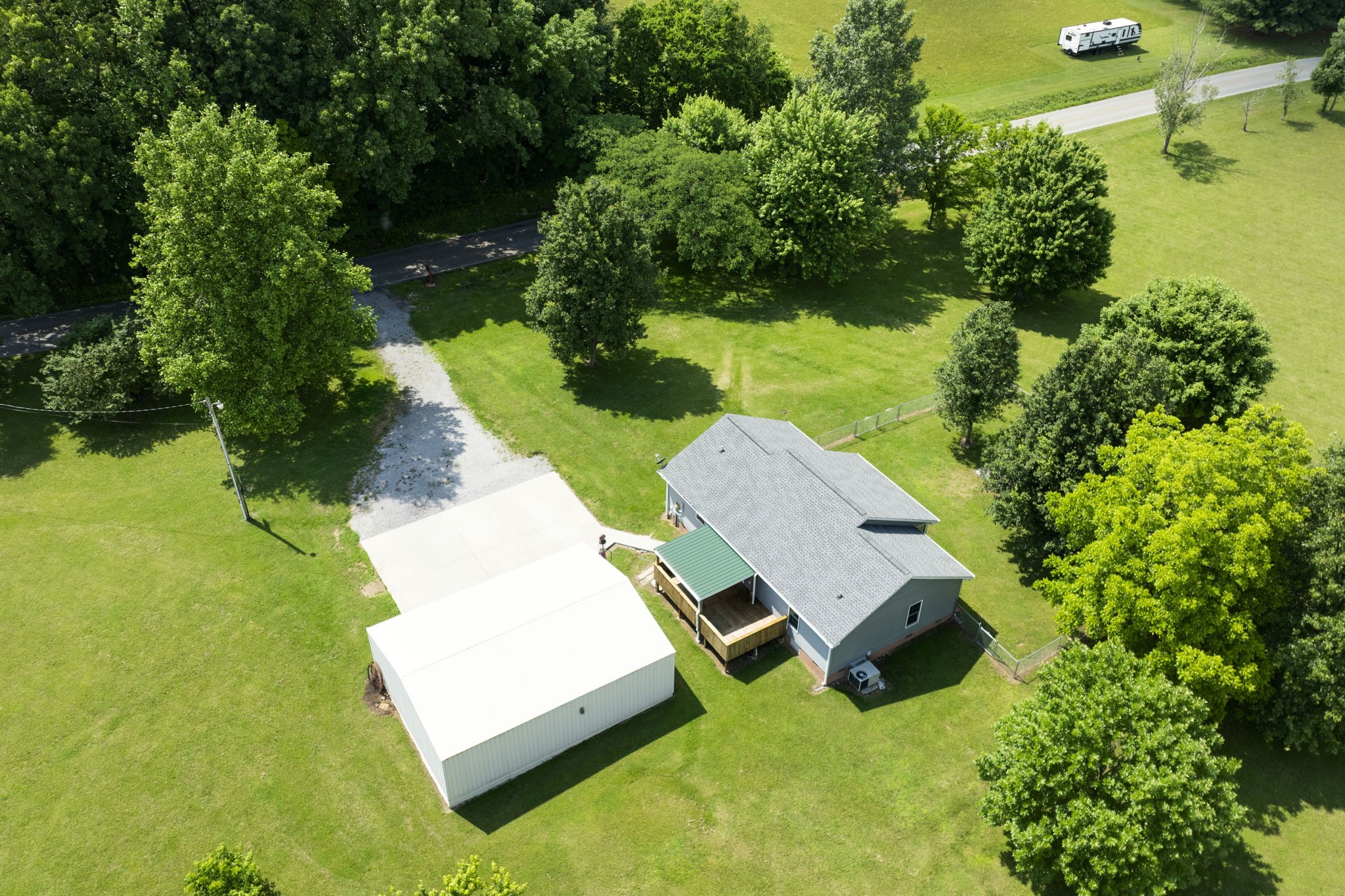 880 Denning Ford Road Portland, TN 37148 - Photo 32 of 54 an aerial view of a house with yard swimming pool and outdoor seating