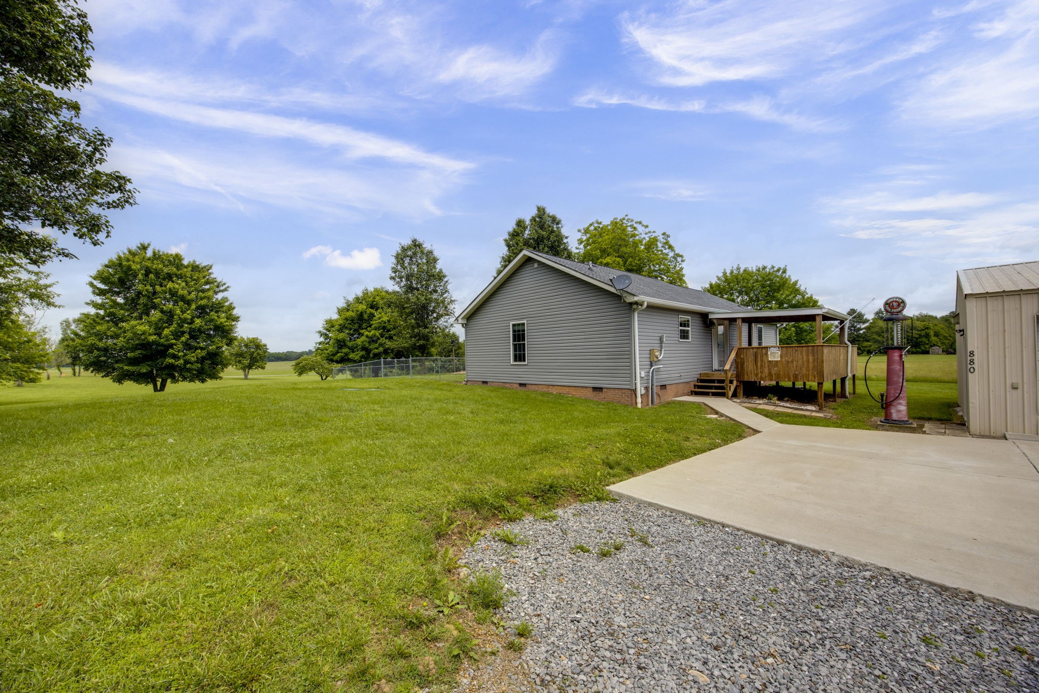 880 Denning Ford Road Portland, TN 37148 - Photo 33 of 54 a view of a house with backyard and garden