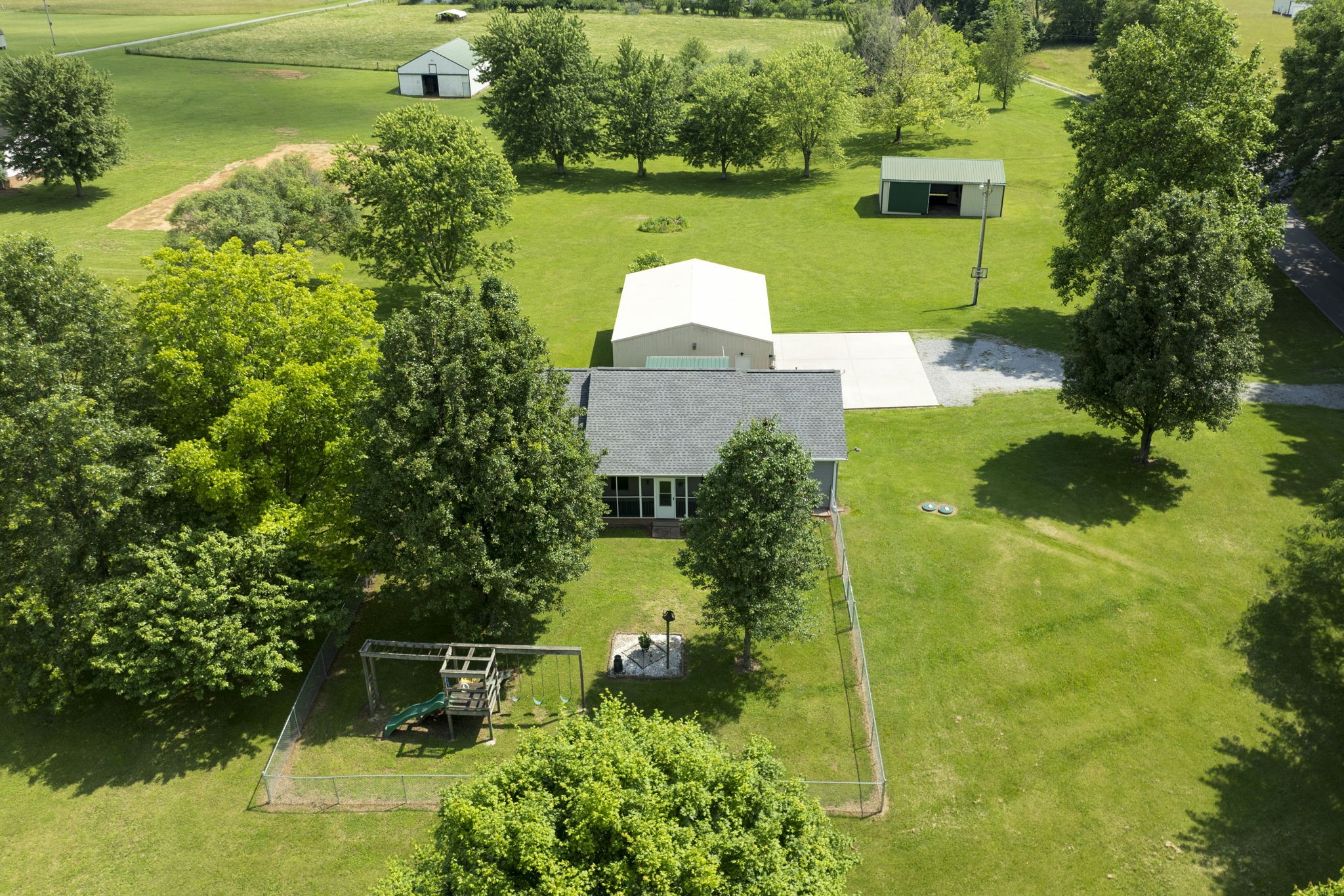 880 Denning Ford Road Portland, TN 37148 - Photo 50 of 54 a view of a lake with a house