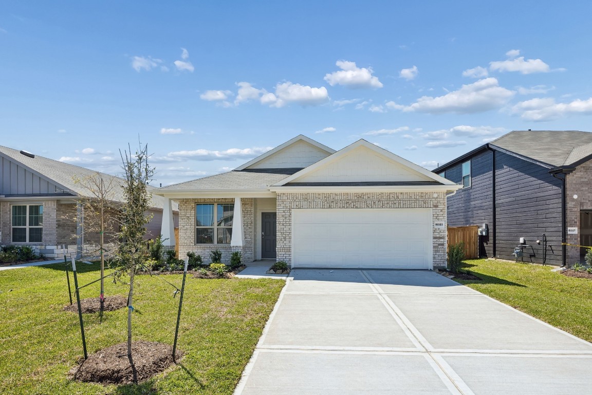 a view of a house with a garden