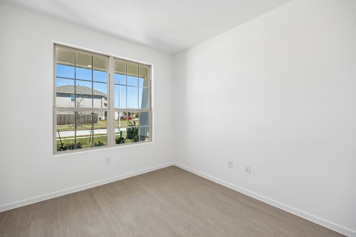 15023 Rustic Moon Road Conroe, TX 77302 - Photo 11 of 32 an empty room with a window
