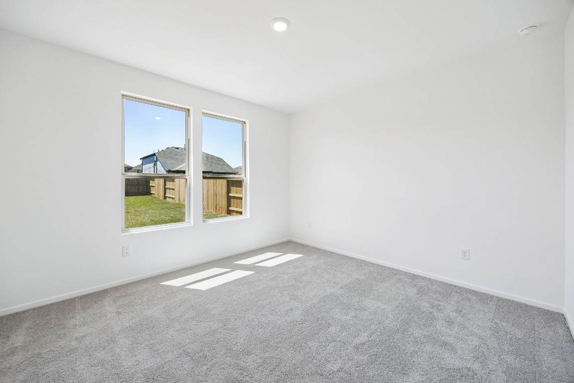 15023 Rustic Moon Road Conroe, TX 77302 - Photo 13 of 32 an empty room with a window