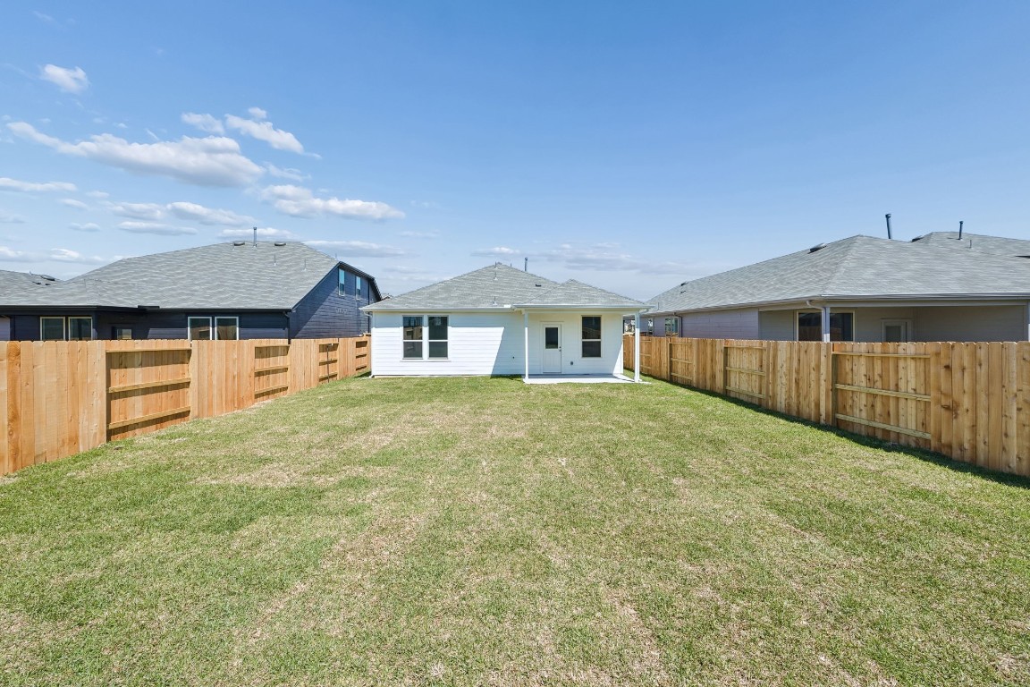 15023 Rustic Moon Road Conroe, TX 77302 - Photo 25 of 32 a front view of a house with yard