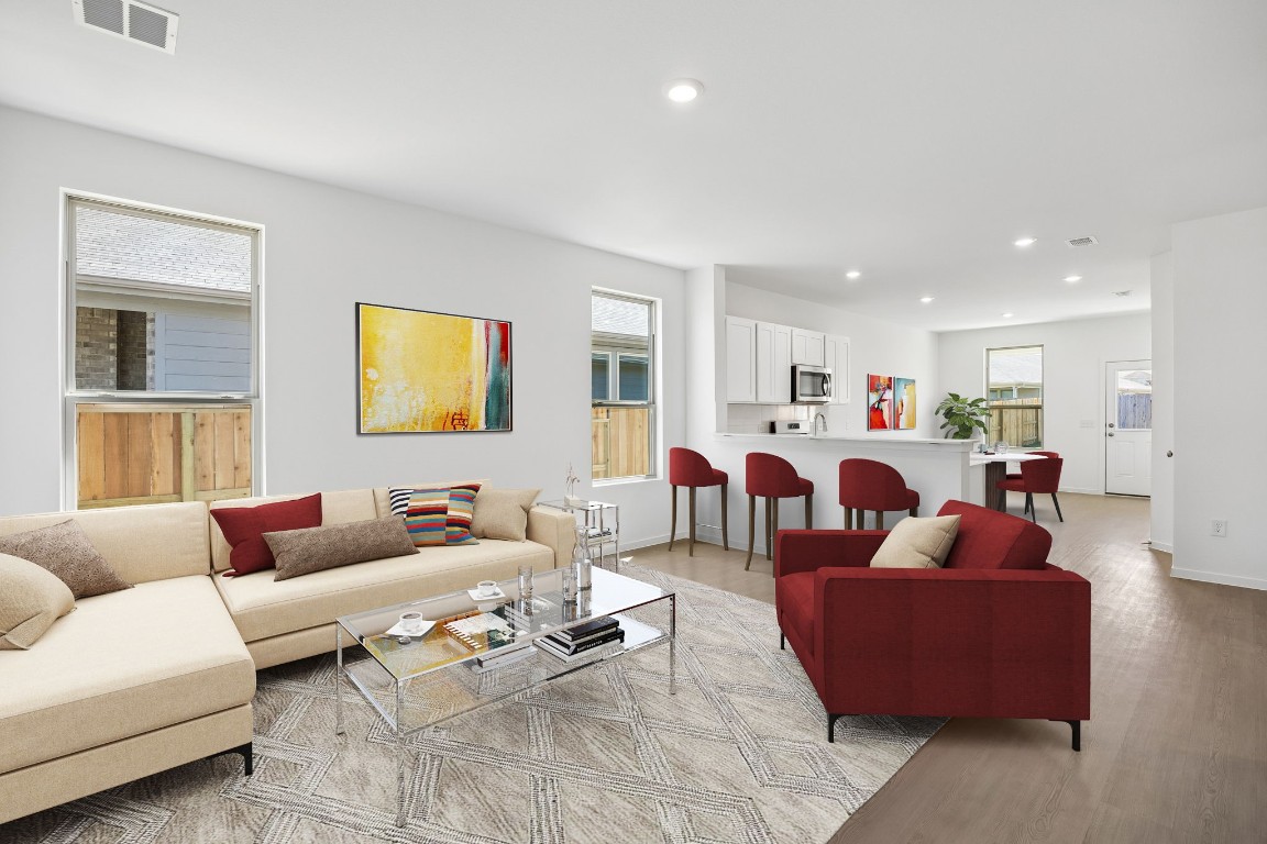 15023 Rustic Moon Road Conroe, TX 77302 - Photo 27 of 32 a living room with furniture kitchen view and a window