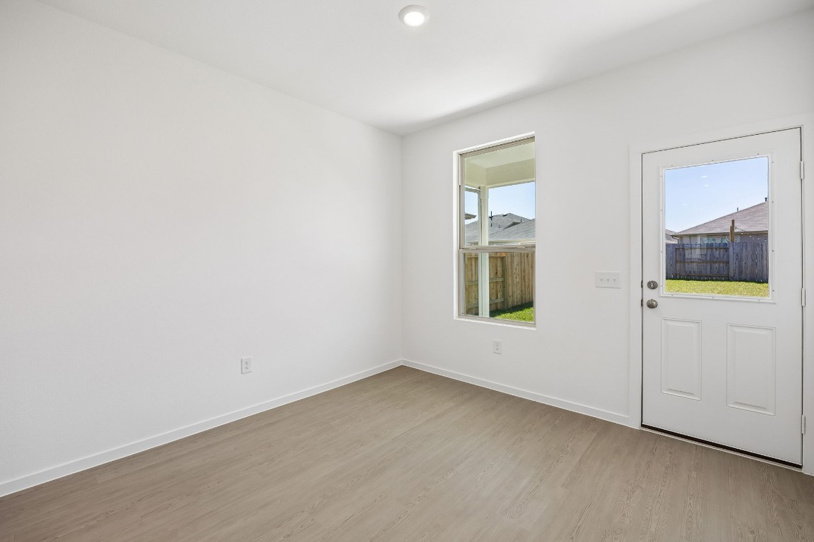 15023 Rustic Moon Road Conroe, TX 77302 - Photo 9 of 32 an empty room with a window