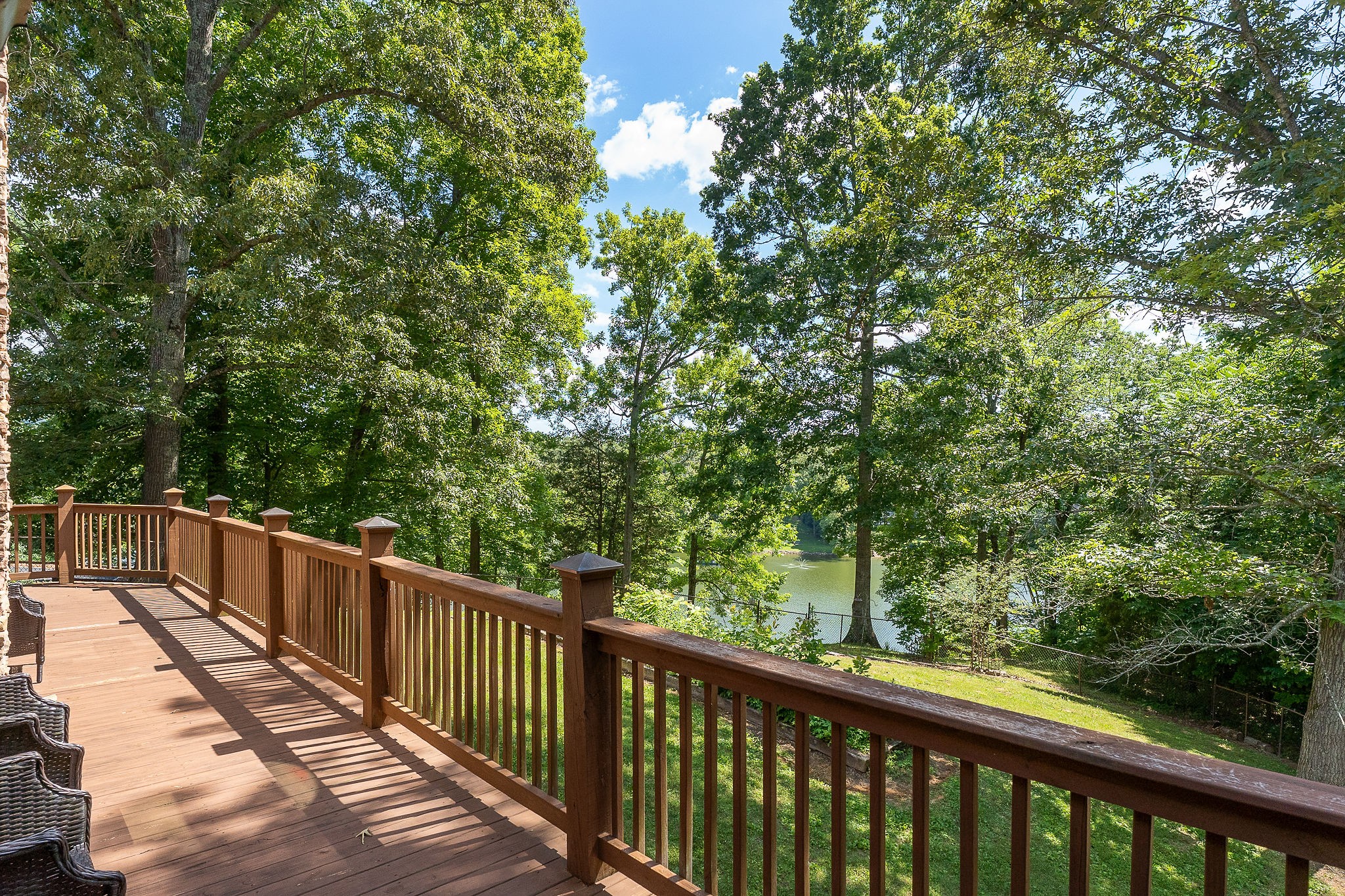 142 Rayahs Way Quebeck, TN 38579 - Photo 41 of 73 a balcony with trees in front of it