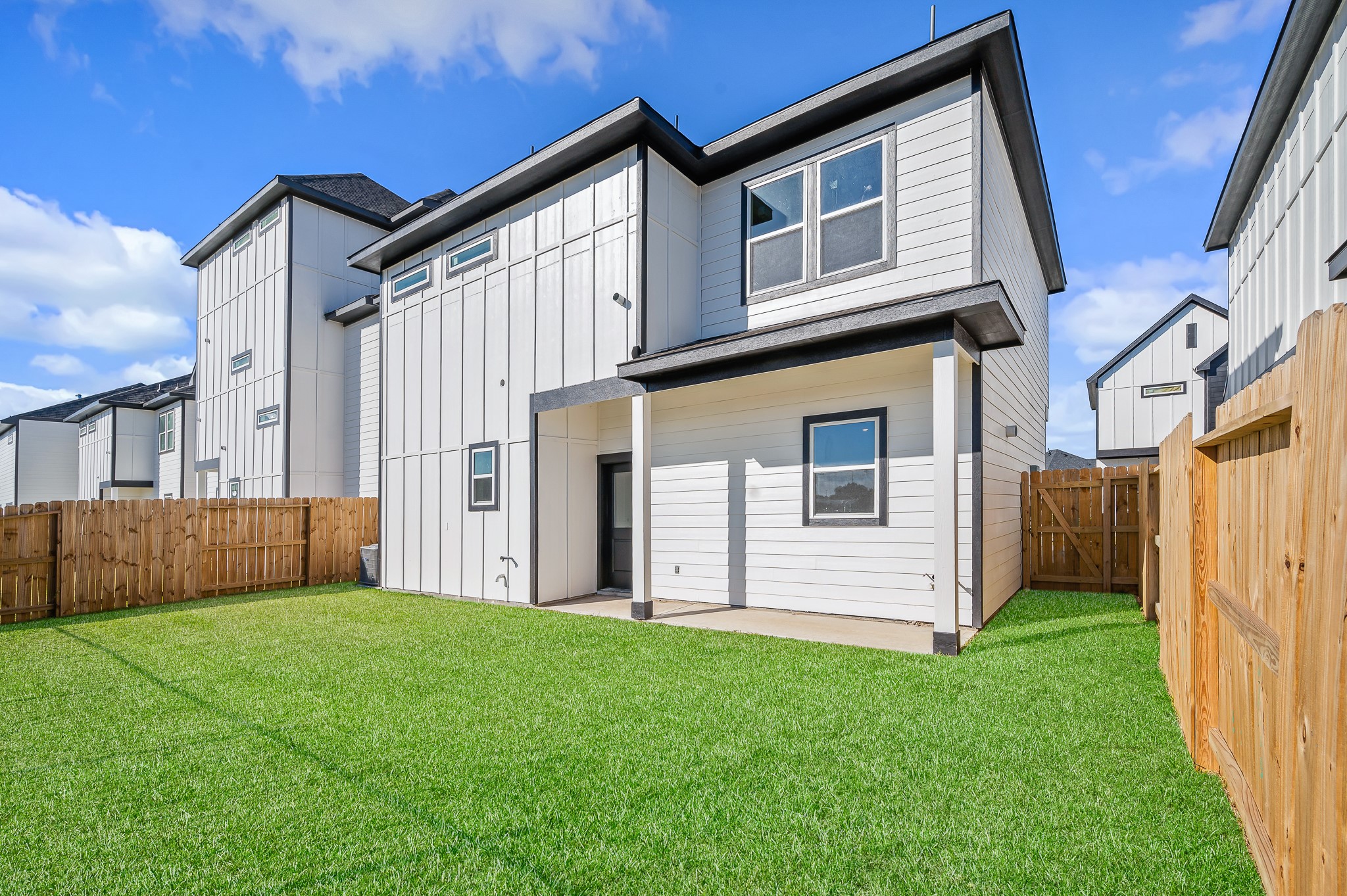 6702 Metro Boulevard, Unit 12 Houston, TX 77083 - Photo 37 of 48 a view of a house with a yard