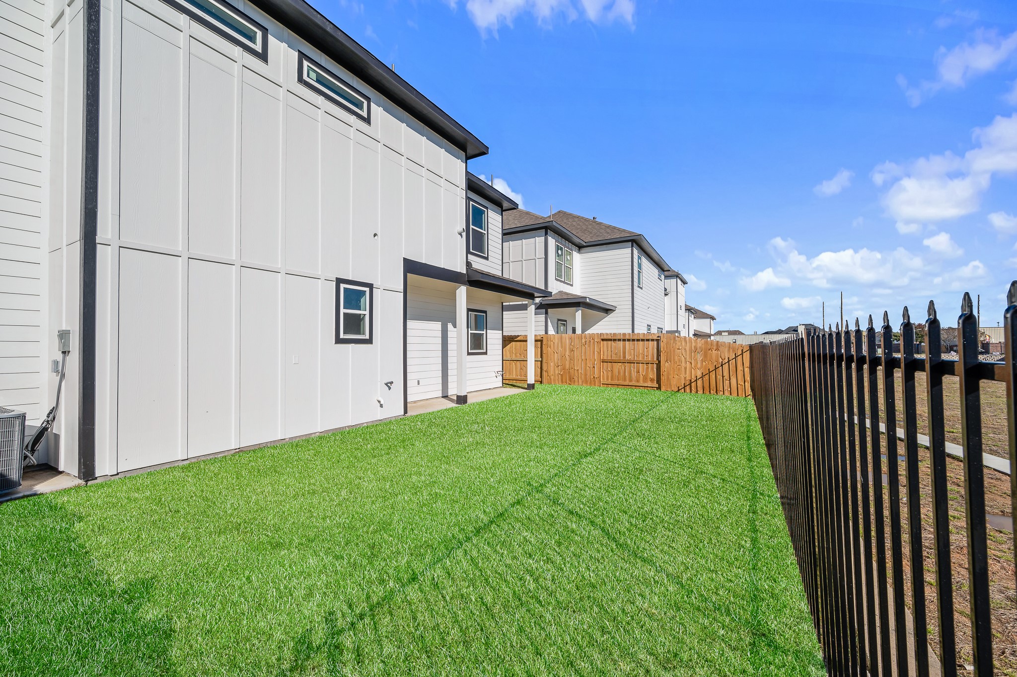 6702 Metro Boulevard, Unit 12 Houston, TX 77083 - Photo 38 of 48 a view of a back yard of the house